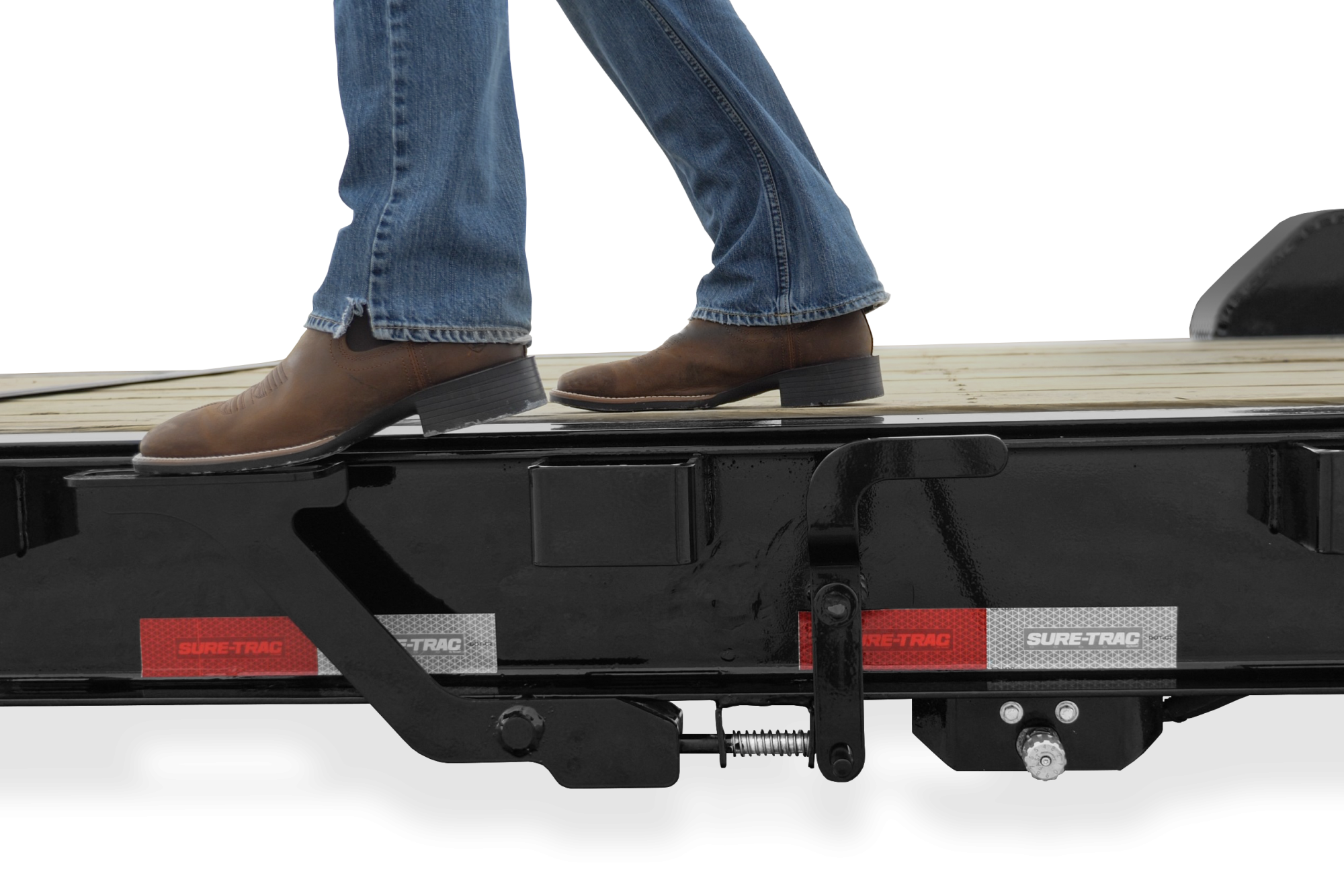 Sure-Trac | Pro Series tilt Bed Trailer | Image | Side view, straight, Pro Series Tilt Bed Trailer with reflective tape, close-up of step on latch
