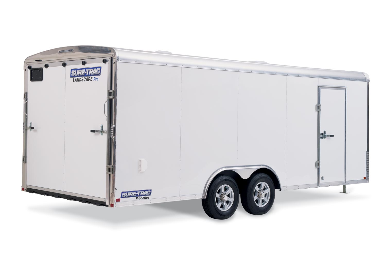 zoomed out side view of the landscape pro round top enclosed trailer with the back door up