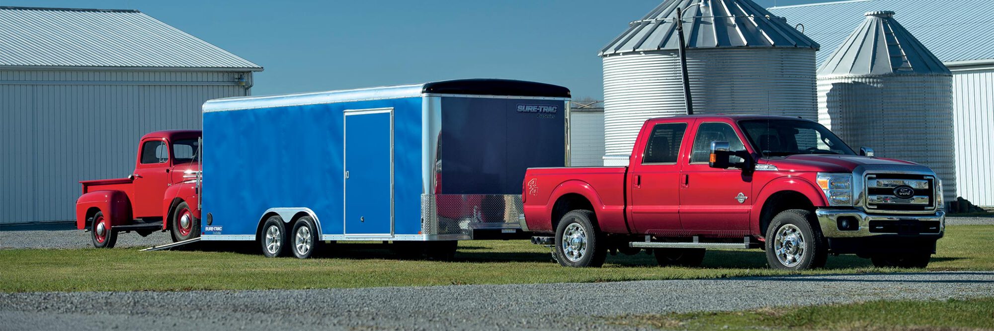 another view of the blue pro series round top enclosed car hauler trailer in the lifestyle magazine
