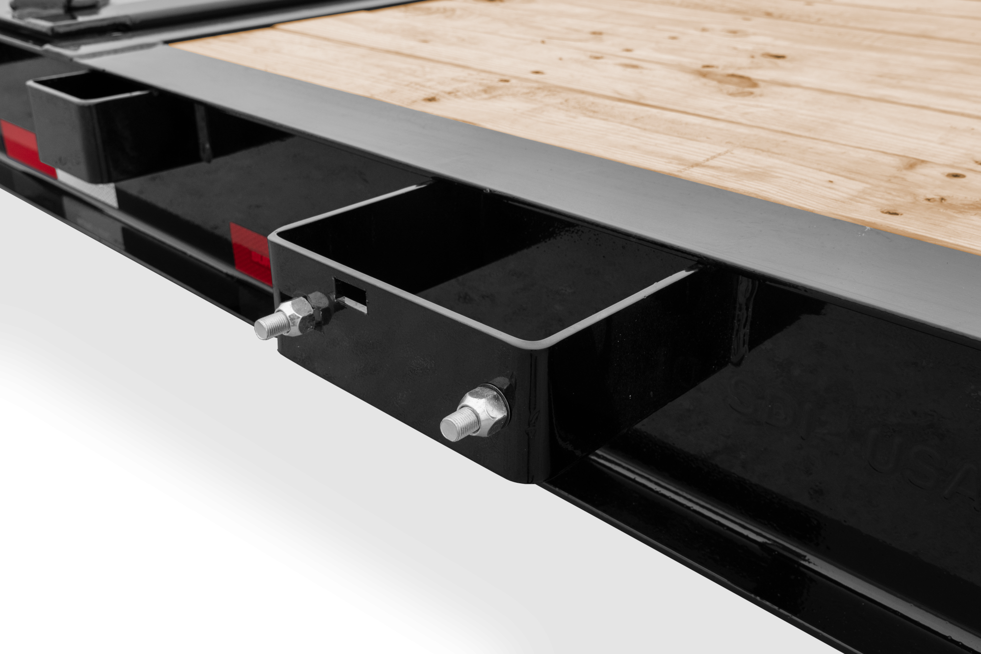 Pro Series Tilt Bed Trailer | Side, tilted, Trailer with reflective tape, close-up of Spare Tire Mount