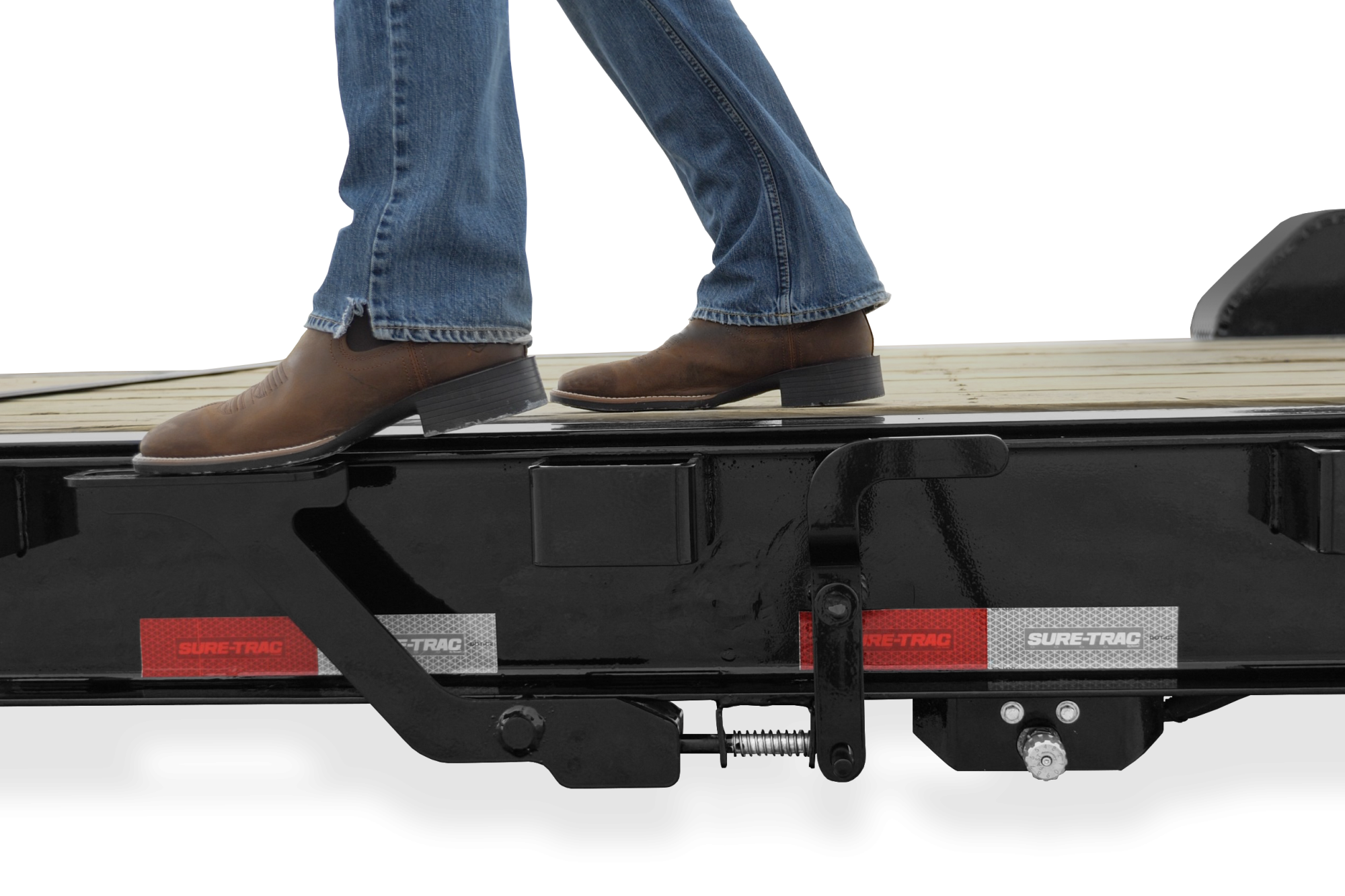 Pro Series Trailer | Side view, straight, Tilt Bed Trailer with reflective tape, close-up of step on latch