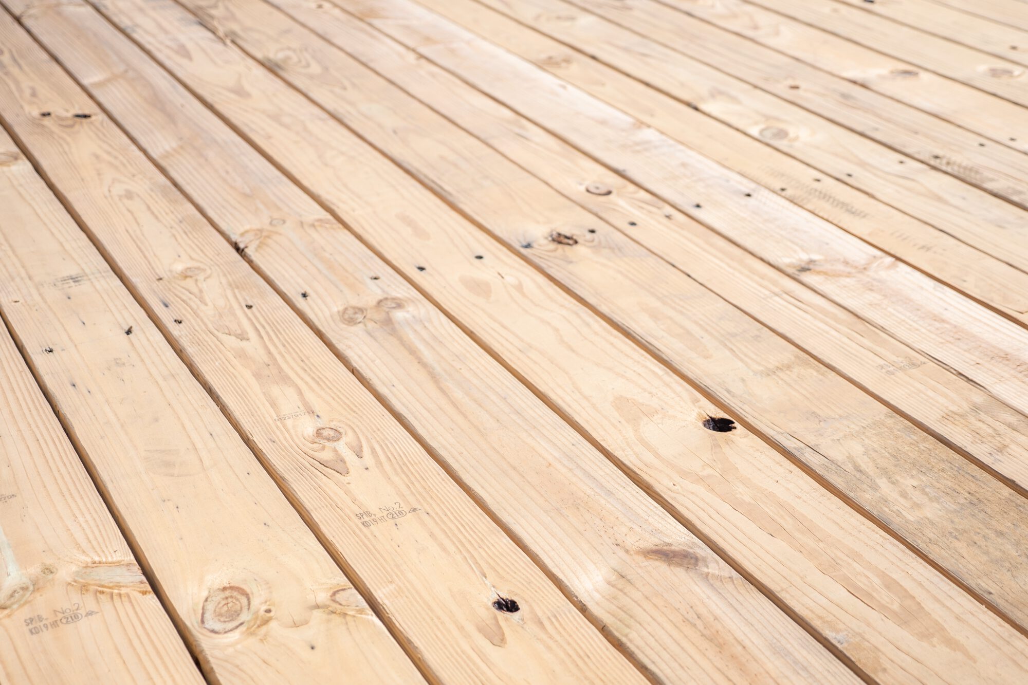 Standard Duty Beavertail Deckover | Top view, tilted, close-up of wood decking