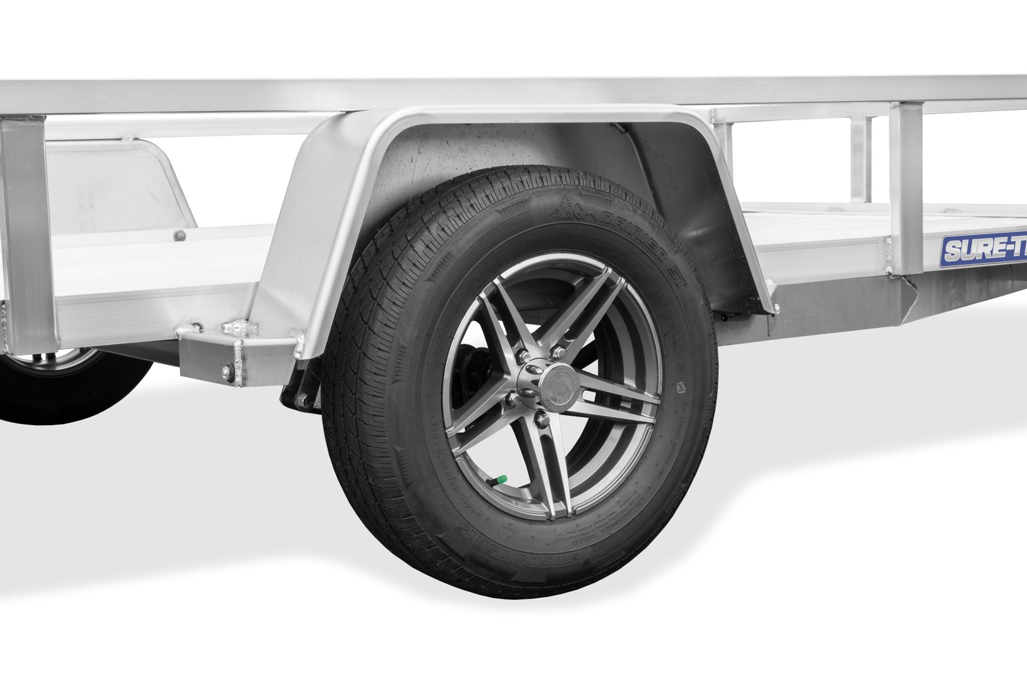 zoomed in view of the wheels on the aluminum single axle tube top trailer
