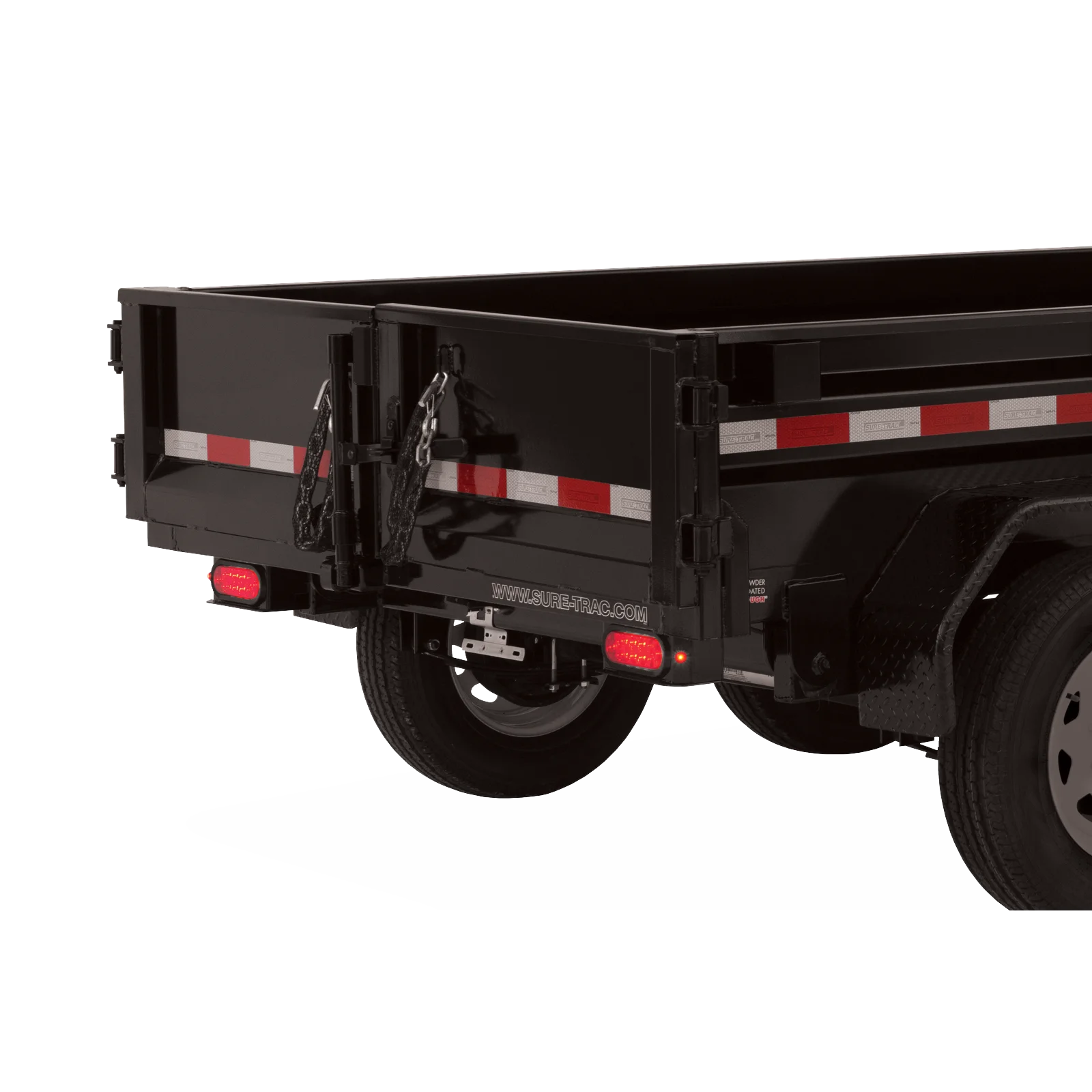 Rear corner of a black dump trailer showing reflective red/white tape, safety chains, tail lights, and wheel.