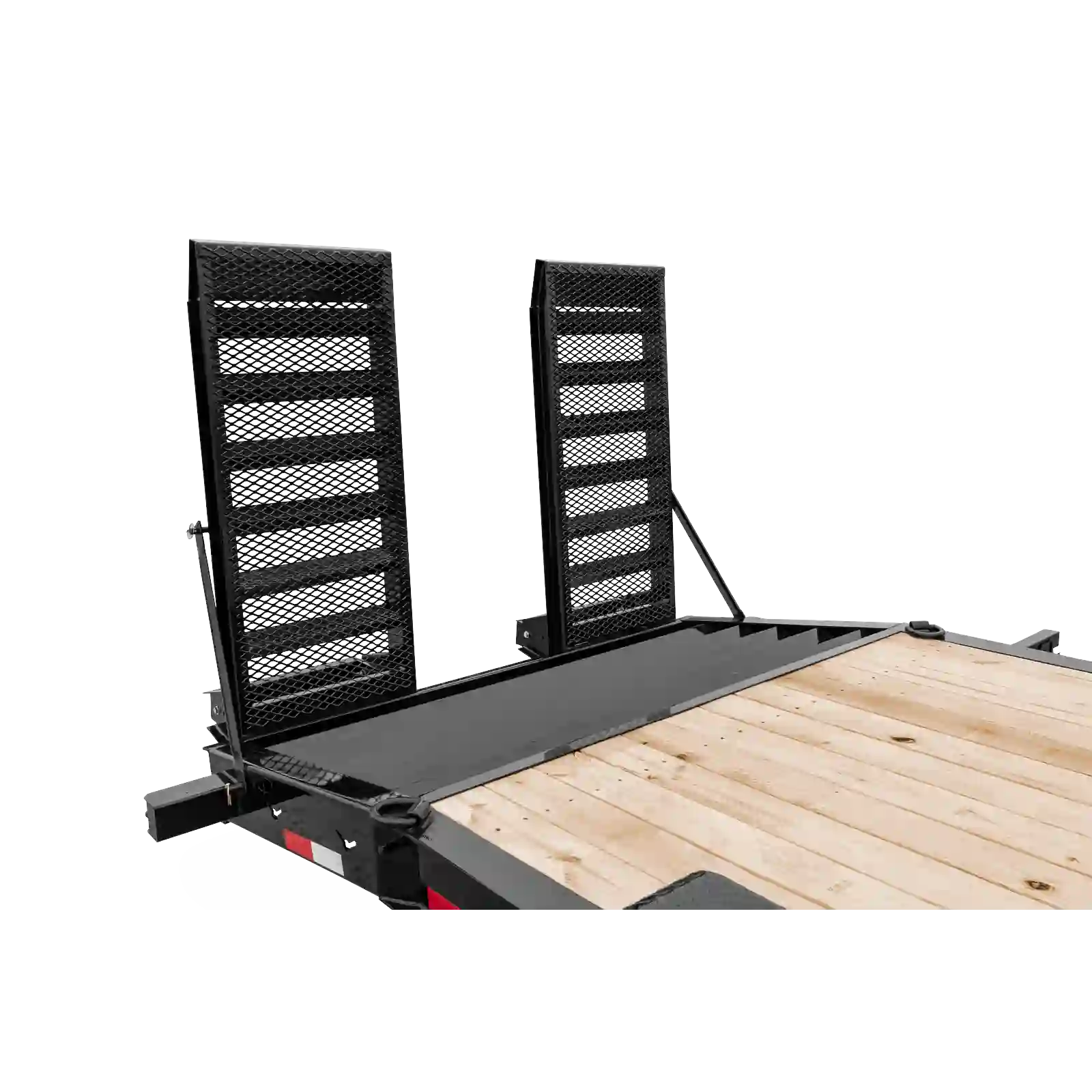 Two tall black mesh racks mounted on a flatbed trailer, likely used for transporting equipment or gear on a wooden deck truck bed.