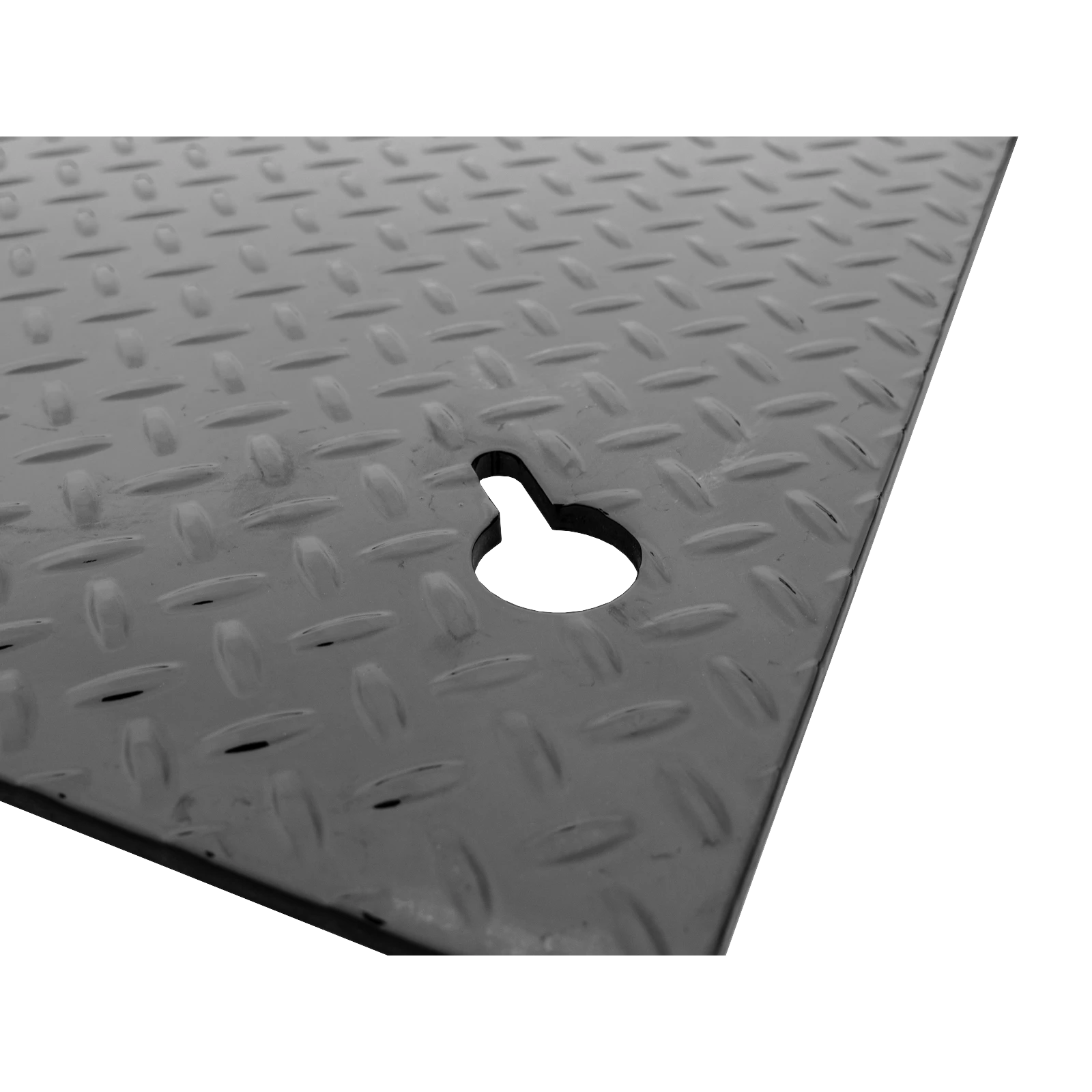 Grey diamond-plate steel sheet with a circular notch cutout near the bottom edge, viewed at an angle.