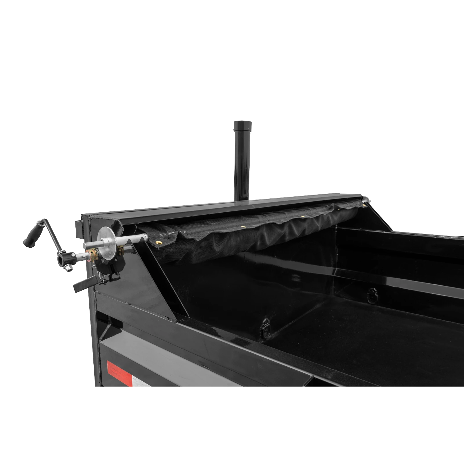Close-up of a black metal trailer/dumper with a vertical pipe/chute and a side crank handle showing mechanical components.