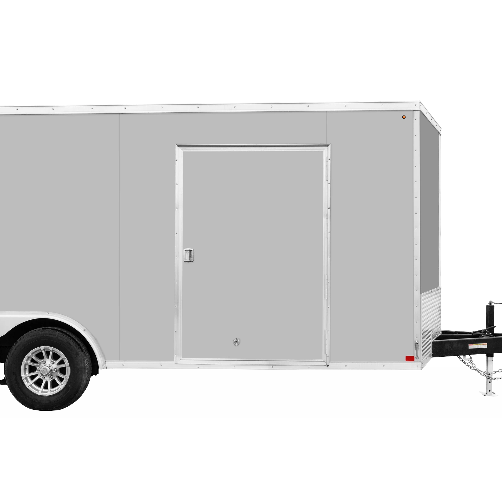 Side view of a gray enclosed cargo trailer with a rear door and a wheel visible at the front left