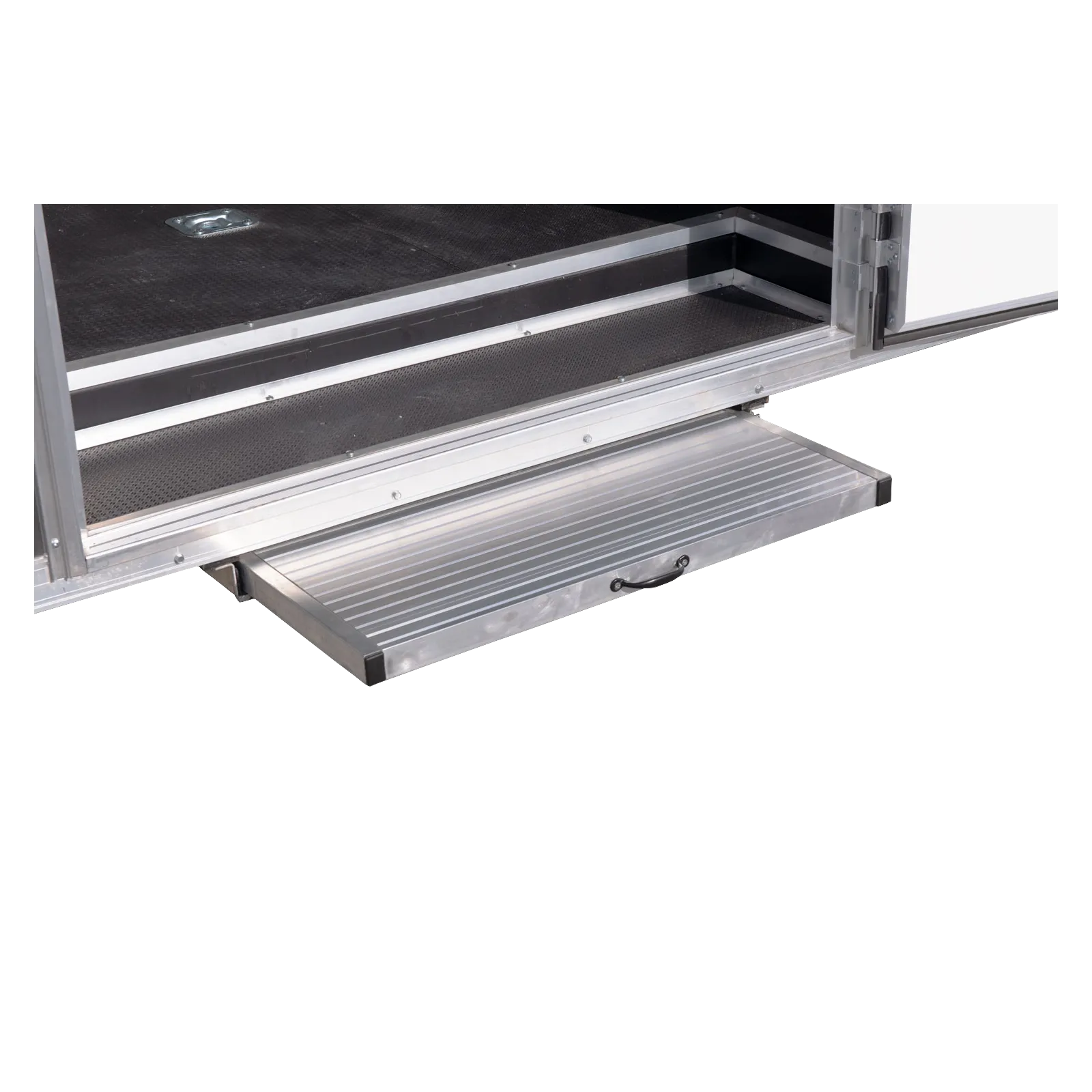 Open metal loading ramp attached to the back of a silver cargo trailer with a textured black floor surface intact