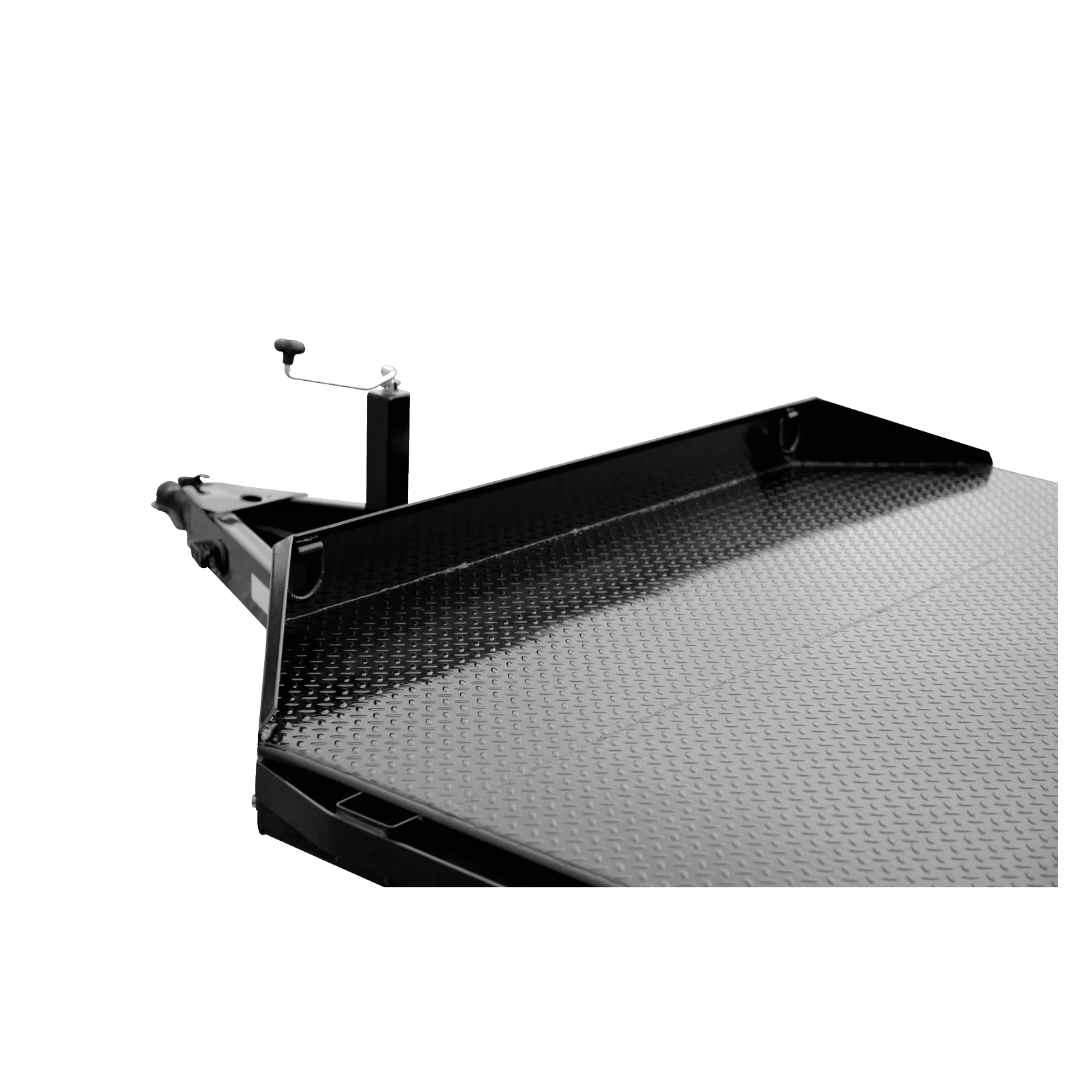 Angled view of a black diamond‑plate loading platform with a small vertical post and metal latch on the edge